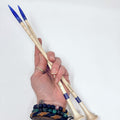 Maple wood knitting needles with purple glitter resin tips