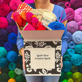 Assorted skeins of colorful recycled silk yarn in a surprise bundle